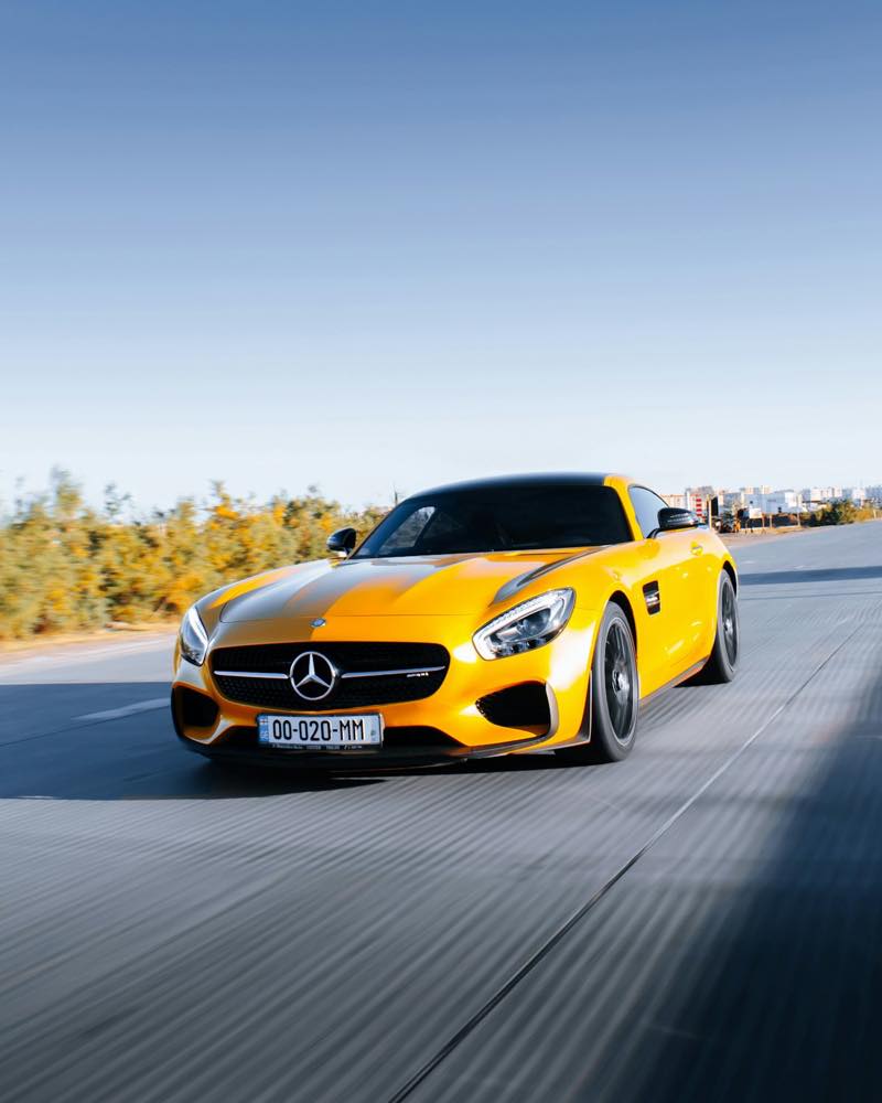 A freshly detailed car with a flawless, glossy finish